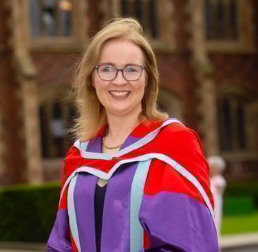 Dr Caroline Millar in formal PhD regalia at Queens University Belfast