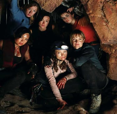 a group of people standing in a cave
