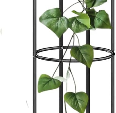 Black metal garden obelisk trellis with climbing green ivy vine for outdoor plant support.