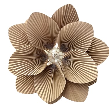 a symmetrical flower-shaped paper lampshade made out of cardboards and paper flowers
