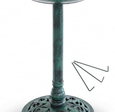 Antique green pedestal bird bath with decorative filigree base and ground stakes for garden decor.