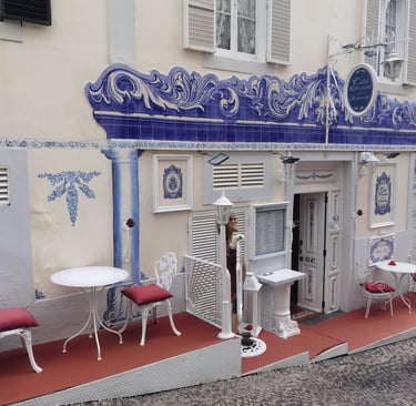 Traditional Portuguese restaurant front with blue azuelos in Madeira
