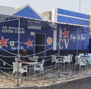 Blue Bar Restaurante Centro Cidade with outdoor patio seating and nautical rope fence in Cape Verde.