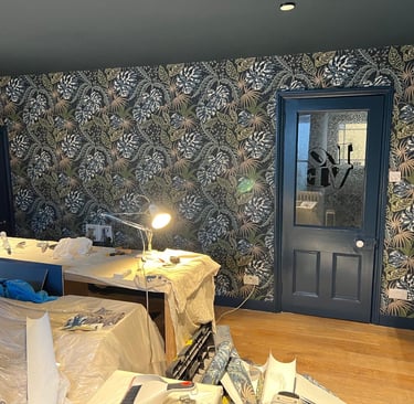 Dark patterned feature wall and painted door in Brighton Sussex, bespoke interior decorating