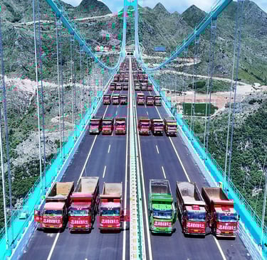 The Huajiang Grand Canyon Bridge load testing, Comstruction Trucks