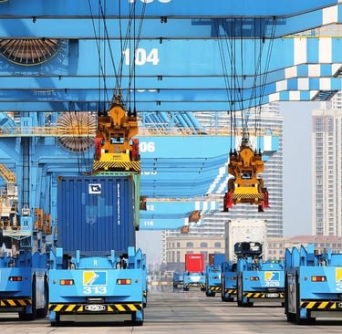 qingdao port china's fully automated port, a group of cranes are being loaded with cargo