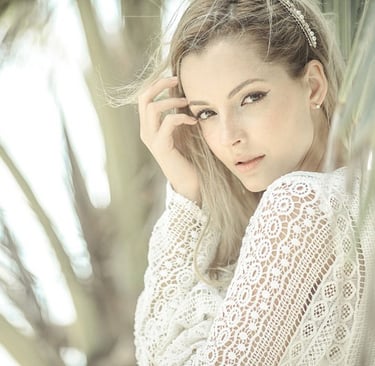 a woman in a white lace dress on koh samui in thailand