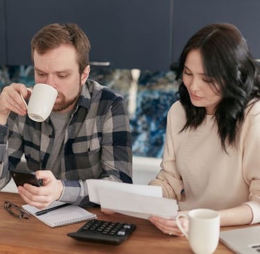 business owners reviewing expenses