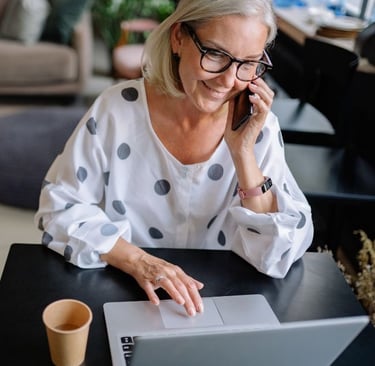 smiling woman on laptop