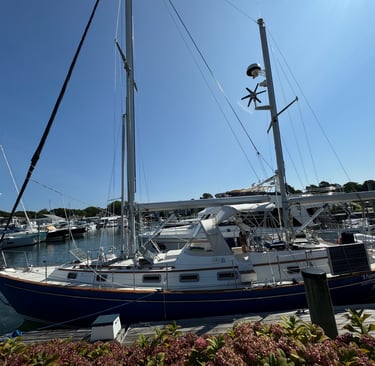 Charter Sailboat Our Passion at dock ready to pick up next sailing charter boat passenger