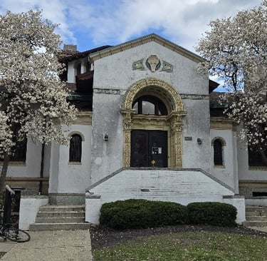 Library with blooming trees in front