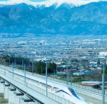 "Japan’s maglev train traveling at 310 mph during a test run, showcasing the future of high-speed ra
