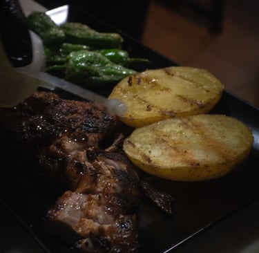 a plate of food with potatoes and potatoes on it