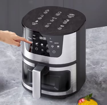 Modern air fryer on a kitchen counter with freshly cooked healthy food