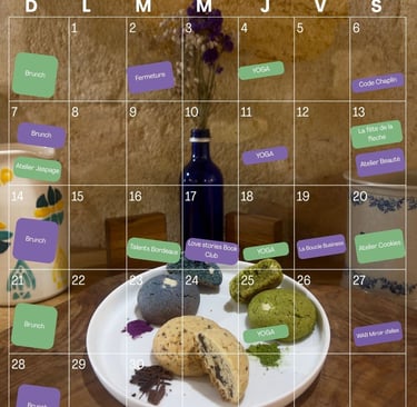 June calendar of Mlle Potts & Co, against a photo background featuring a plate of colourful cookies.
