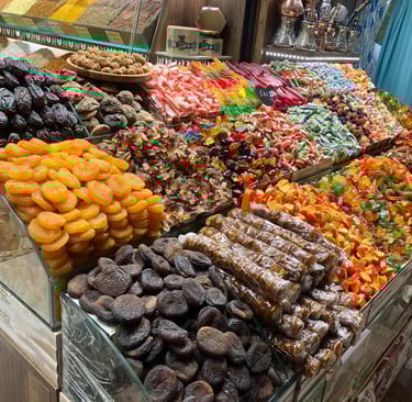 Stand of various fruits and sweets 