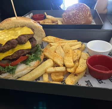 Double Cheeseburger and fries with sauces