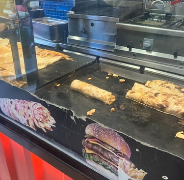 Turkish chicken wraps on a griddle