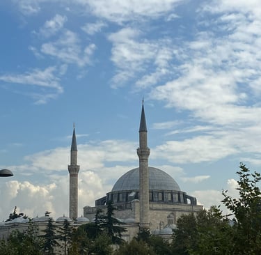 a mosque with a blue sky in the background