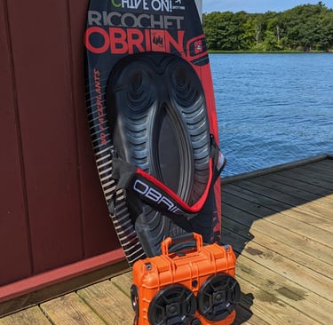 awesome chillantix boombox by a kneeboard on a dock