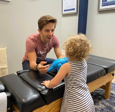 Child with sensory issues getting adjusted to calm her nervous system down. 