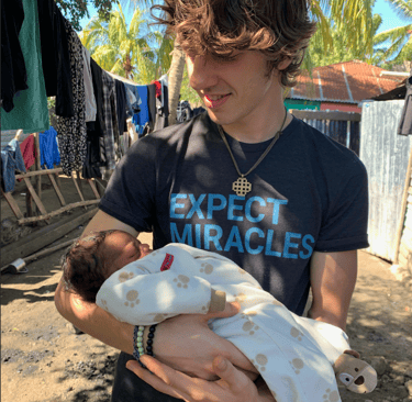 New baby gets first chiropractic adjustment from Franklin Pediatric Chiropractor