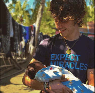Christian chiropractor from Franklin TN serving Haitian families with nervous system-focused care