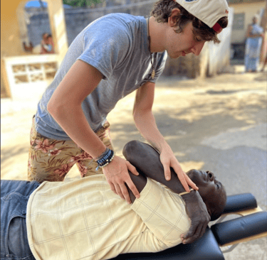 "Franklin TN chiropractor on a faith-led mission trip, adjusting children and families in Haiti