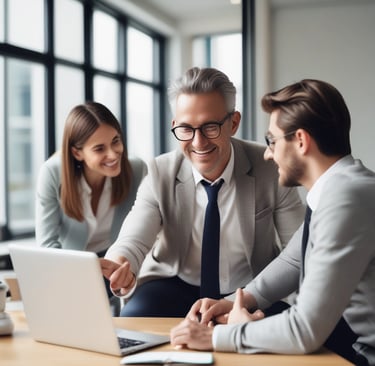 man in blue crew neck t-shirt holding white printer paper