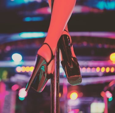 a woman's legs in high heels and heels