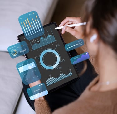 a woman sitting on a couch with a tablet and a tablet