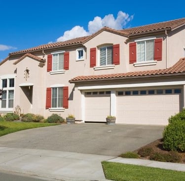 a house with a two driveway car