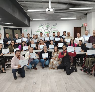 a group of people holding up certificates and holding certificates