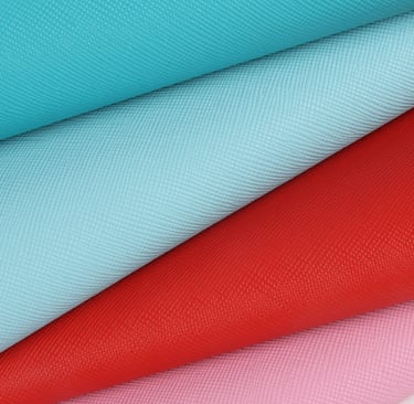 Colorful PU and vegan leather options, offering a luxurious feel for premium bags.