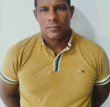 a man in a yellow shirt and a white shirt