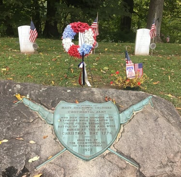 a memorial plaque on a memorial plaque in a cemetery