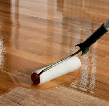 Wood floor is being finished after sanding to perfection