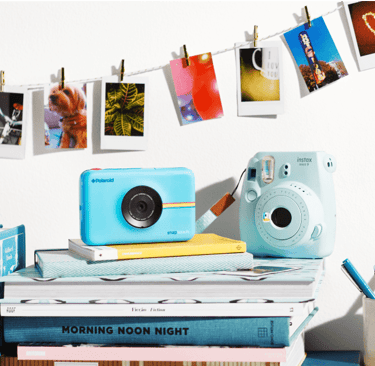 image appareils photos sur des livres