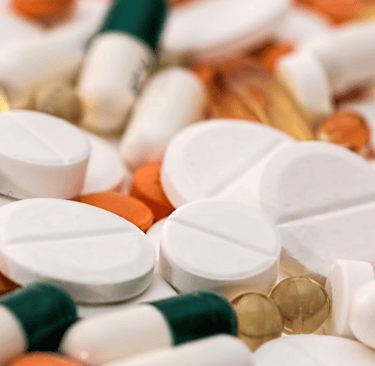 a bunch of pills on a table