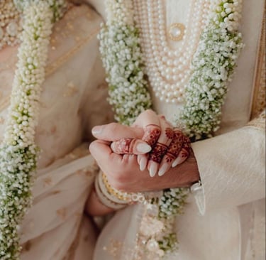 a bride and groom holding hands