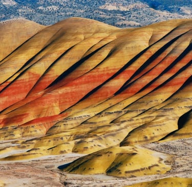 Vibrant layered desert rock formations in remote landscape, geological wonder and rugged outdoor terrain
