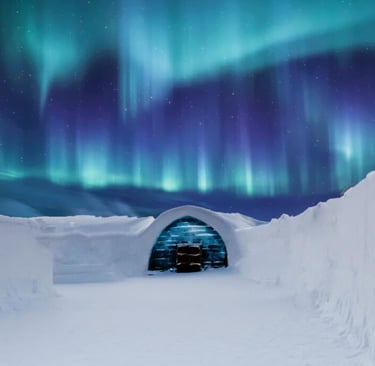 Igloo-style snow shelter under northern lights, arctic survival and cold weather camp