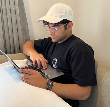 Medhansh Seth working on his book about startups