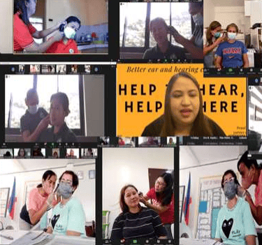 a group of people are gathered around a video conference