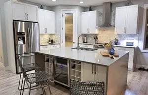 Kelowna custom kitchen with island and built-in wine fridge