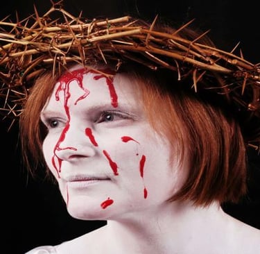 a woman with a crown of thorns on her head
