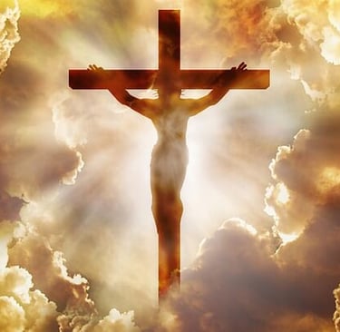 Silhouetted figure on a cross with golden clouds and radiant light beams in the background.