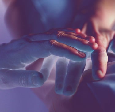 a person hand holding another one