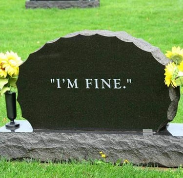 a stone memorial marked 'I'm fine'