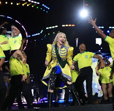 a woman in a yellow dress and a man in a yellow shirt and black pants
